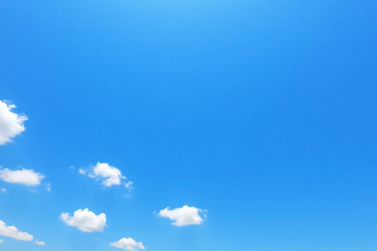 Blue sky with soft clouds